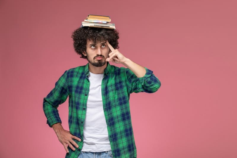 oman with books on his head
